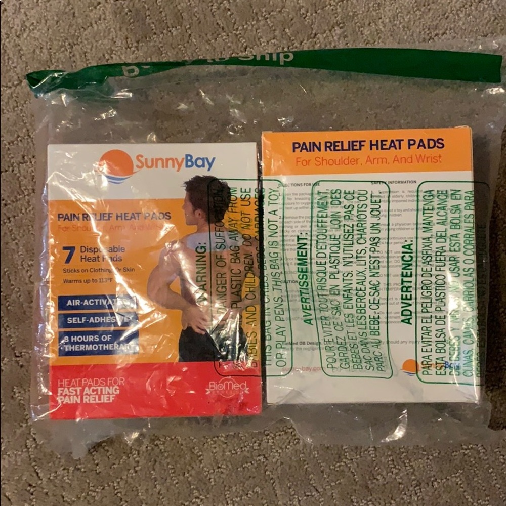 2 packs of pain relief heat pads-still unopened.